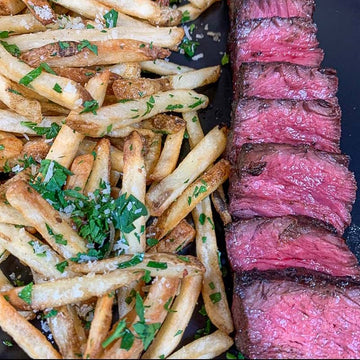 Certified ONYA Hanger Steak from BetterFed Beef served with homemade parmesan garlic french fries