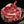Certified ONYA® Tomahawk Ribeye photographed raw with beautiful marbling. Shown with garnishes including sea salt and rosemary