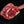 Side profile photo of a Certified ONYA® Tomahawk Ribeye with abundant marbling and as tender as Wagyu beef. Three inches thick with an exposed bone handle