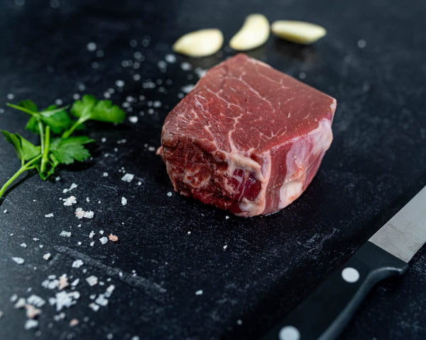 BetterFed Beef Company Certified ONYA® petite filet mignon steak tenderloin with salt, garlic and  parsley